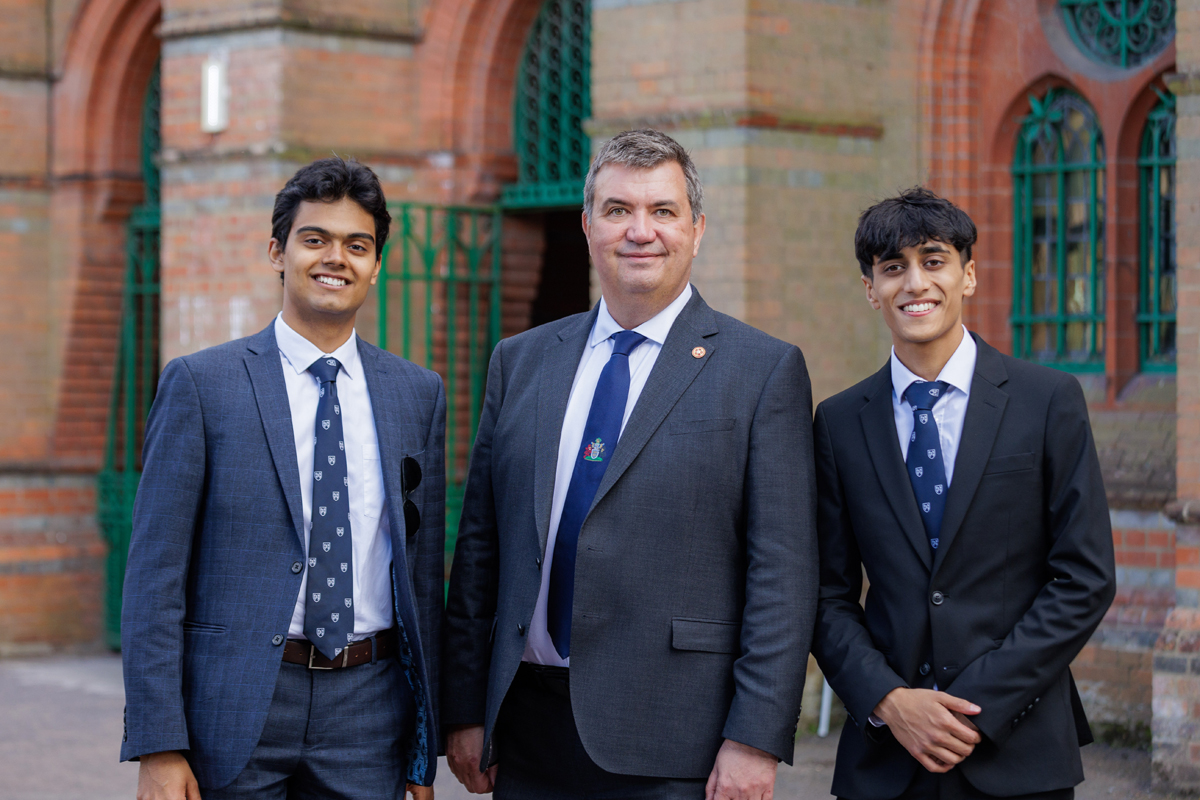 Stefan Fafinski with incoming and outgoing Reading School Captains.